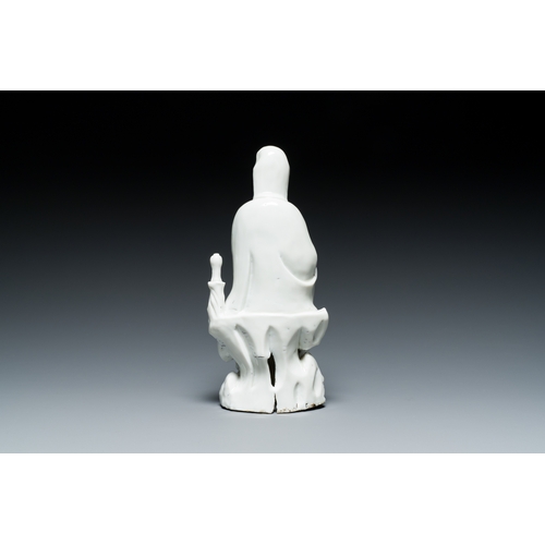 156 - A Chinese Dehua blanc de Chine figure of Guanyin with a boy, Kangxi/QianlongDescription:H.: 26 cmCon... 