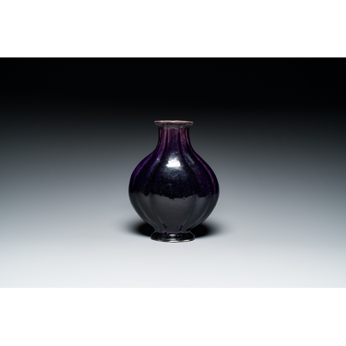 162 - A Chinese monochrome aubergine-glazed vase, 19th C.Description:H.: 25 cmCondition reports:Please con... 