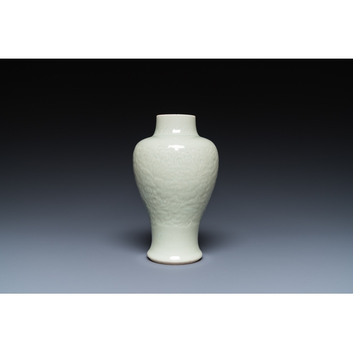 163 - A Chinese celadon-glazed vase with underglaze floral design, KangxiDescription:H.: 18 cmCondition re... 