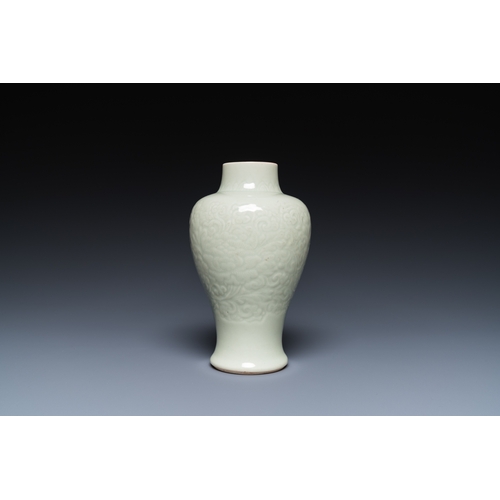 163 - A Chinese celadon-glazed vase with underglaze floral design, KangxiDescription:H.: 18 cmCondition re... 