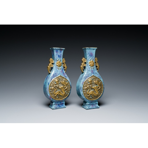 168 - A pair of Chinese flambe-glazed vases with gilt 'dragon' medallions, Qianlong mark, 19th C.Descripti... 