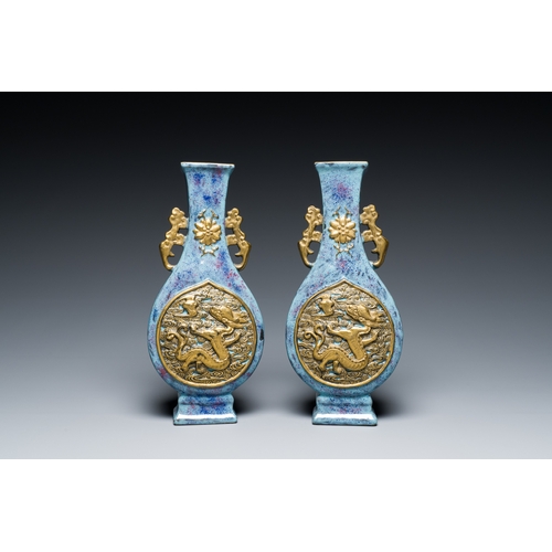 168 - A pair of Chinese flambe-glazed vases with gilt 'dragon' medallions, Qianlong mark, 19th C.Descripti... 