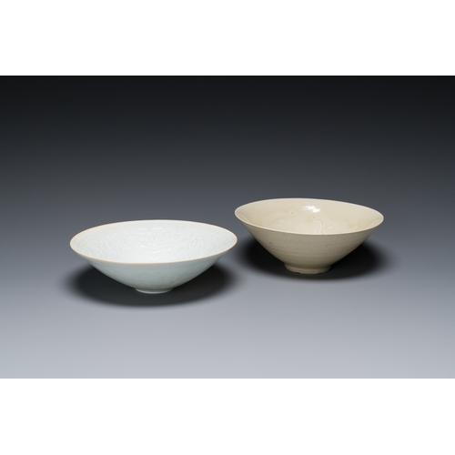 173 - A Chinese qingbai-glazed 'phoenixes' bowl and a cream-glazed 'fish' bowl, probably SongDescription:D... 