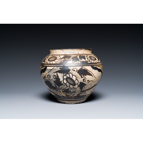 174 - A Chinese Cizhou pottery jar with floral design, SongDescription:H.: 20 cmCondition reports:Please c... 