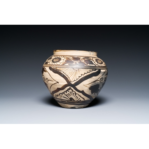 174 - A Chinese Cizhou pottery jar with floral design, SongDescription:H.: 20 cmCondition reports:Please c... 