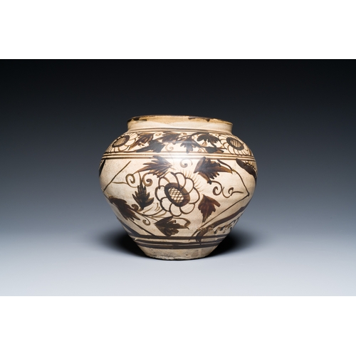 174 - A Chinese Cizhou pottery jar with floral design, SongDescription:H.: 20 cmCondition reports:Please c... 