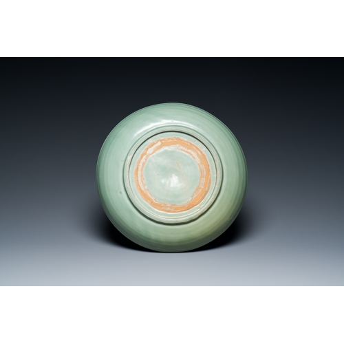 178 - A Chinese Longquan celadon dish with underglaze floral design, MingDescription:Dia.: 34 cm - H.: 6 c... 