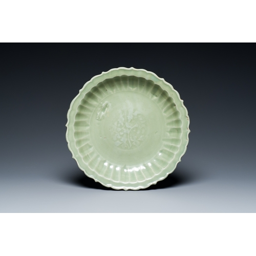 179 - A Chinese Longquan celadon lotus-form dish with underglaze floral design, MingDescription:Dia.: 31 c... 