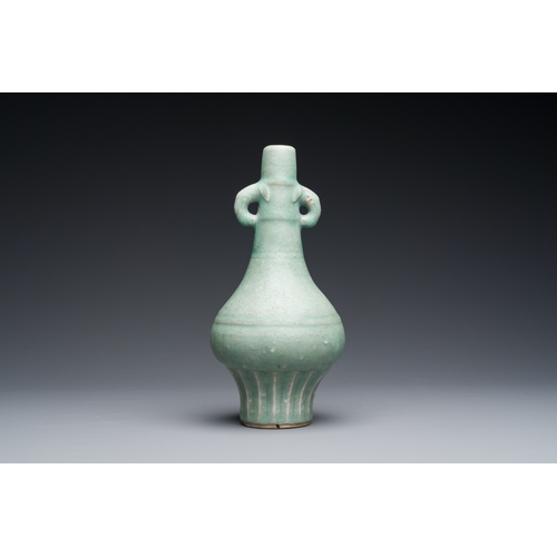 180 - A Chinese Longquan celadon bottle vase, Yuan/MingDescription:H.: 22,5 cmCondition reports:Please con... 