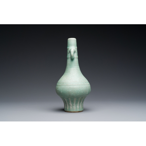 180 - A Chinese Longquan celadon bottle vase, Yuan/MingDescription:H.: 22,5 cmCondition reports:Please con... 