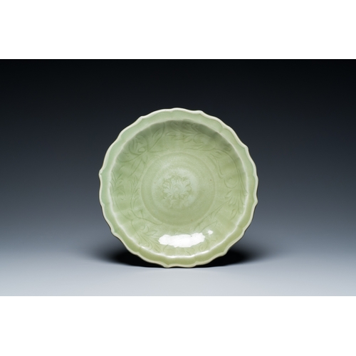 184 - A Chinese Longquan celadon lotus-form dish with underglaze floral design, MingDescription:Dia.: 29,5... 