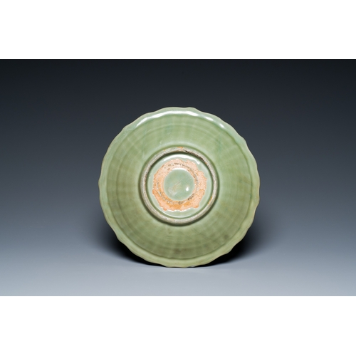 184 - A Chinese Longquan celadon lotus-form dish with underglaze floral design, MingDescription:Dia.: 29,5... 