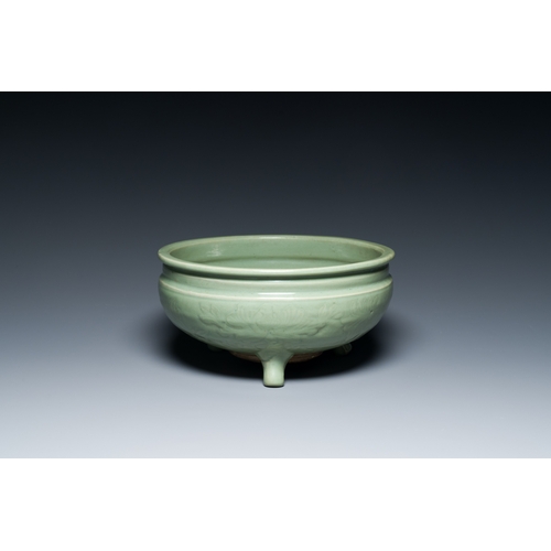 186 - A Chinese Longquan celadon tripod censer with underglaze decoration, MingDescription:Dia.: 29,5 cm -... 