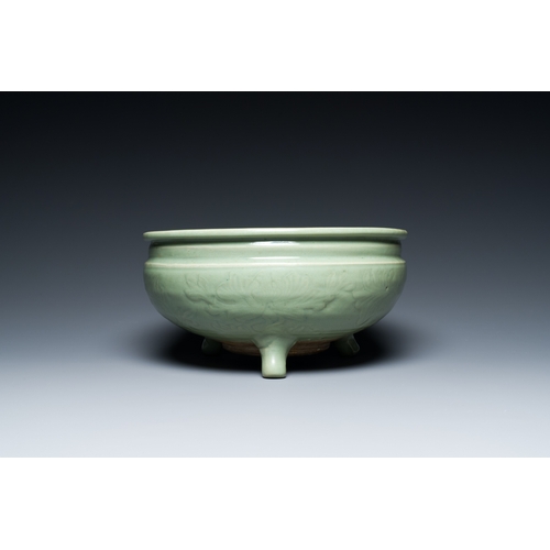 186 - A Chinese Longquan celadon tripod censer with underglaze decoration, MingDescription:Dia.: 29,5 cm -... 