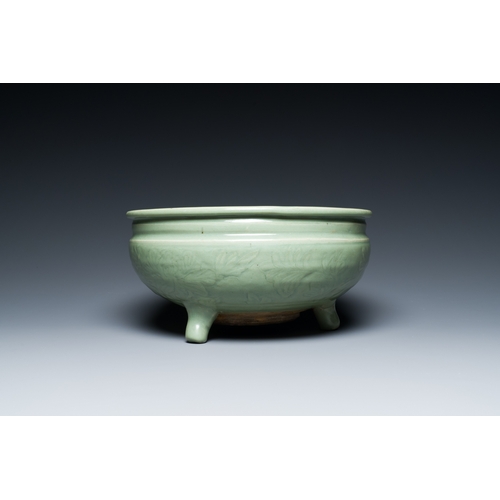 186 - A Chinese Longquan celadon tripod censer with underglaze decoration, MingDescription:Dia.: 29,5 cm -... 