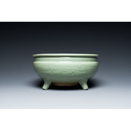 186 - A Chinese Longquan celadon tripod censer with underglaze decoration, MingDescription:Dia.: 29,5 cm -... 