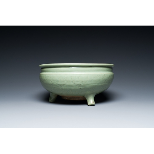 186 - A Chinese Longquan celadon tripod censer with underglaze decoration, MingDescription:Dia.: 29,5 cm -... 