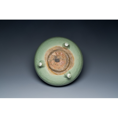 186 - A Chinese Longquan celadon tripod censer with underglaze decoration, MingDescription:Dia.: 29,5 cm -... 