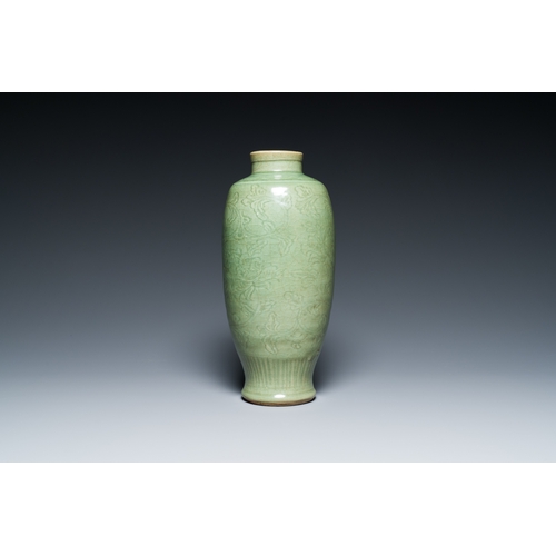 192 - A Chinese Longquan celadon vase with underglaze floral design, MingDescription:H.: 33,5 cm Provenanc... 