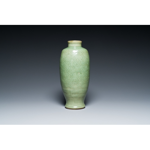 192 - A Chinese Longquan celadon vase with underglaze floral design, MingDescription:H.: 33,5 cm Provenanc... 