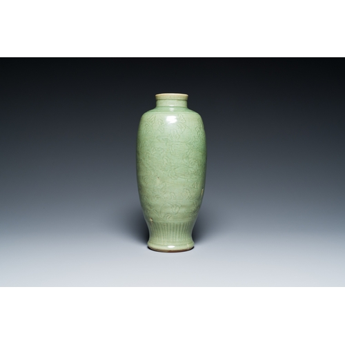 192 - A Chinese Longquan celadon vase with underglaze floral design, MingDescription:H.: 33,5 cm Provenanc... 