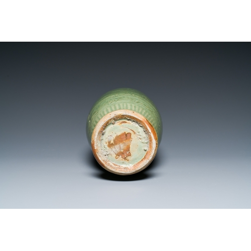 192 - A Chinese Longquan celadon vase with underglaze floral design, MingDescription:H.: 33,5 cm Provenanc... 