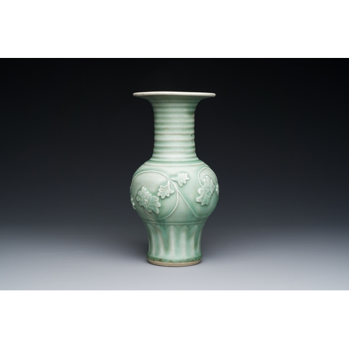 196 - A Chinese Longquan celadon 'peony scroll' vase, YuanDescription:H.: 22,5 cmCondition reports:Please ... 