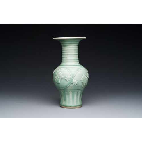 196 - A Chinese Longquan celadon 'peony scroll' vase, YuanDescription:H.: 22,5 cmCondition reports:Please ... 