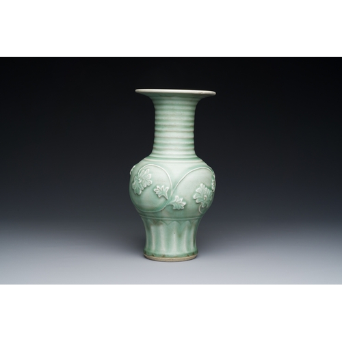 196 - A Chinese Longquan celadon 'peony scroll' vase, YuanDescription:H.: 22,5 cmCondition reports:Please ... 