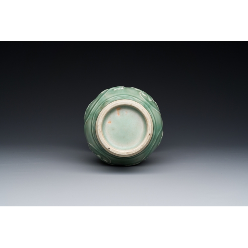 196 - A Chinese Longquan celadon 'peony scroll' vase, YuanDescription:H.: 22,5 cmCondition reports:Please ... 