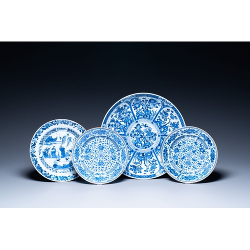 262 - A Chinese blue and white dish and three plates, Kangxi/YongzhengDescription:Dia.: 35,5 cm (the dish)... 