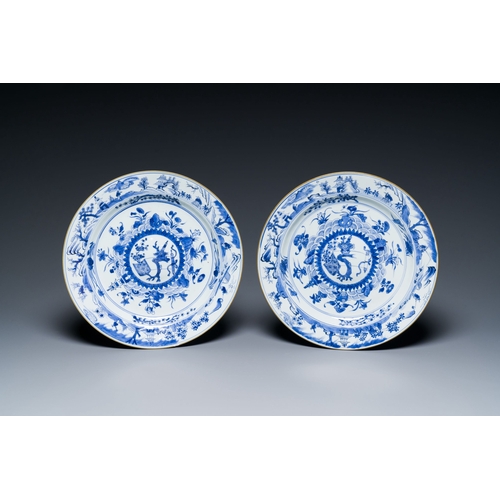 291 - A pair of Chinese blue and white dishes with raised central medallions, KangxiDescription:Dia.: 29 c... 