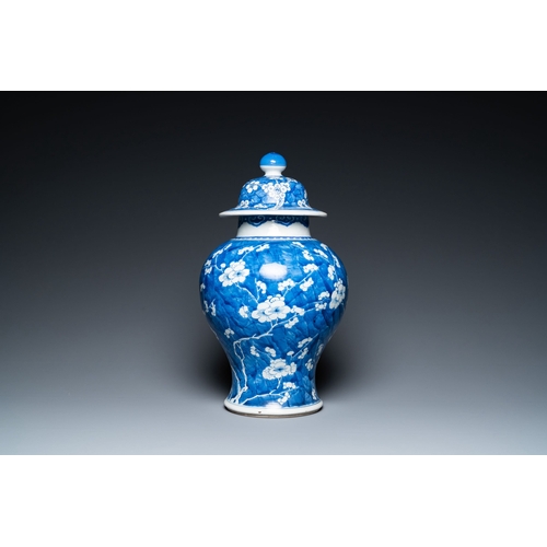 296 - A Chinese blue and white 'prunus on cracked ice' vase and cover, KangxiDescription:H.: 44,5 cm Condi... 