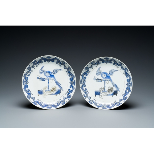 216 - A pair of Chinese eggshell Pronk studio 'parrot and spaniel' plates, Yongzheng/QianlongDescription:D... 