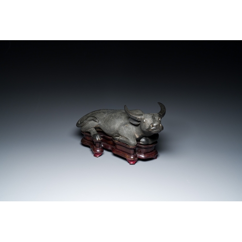 223 - A large Chinese grisaille sculpture of a buffalo on wooden stand, 18/19th CDescription:Dim.: 44,5 x ... 