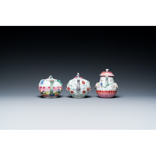 247 - Three Chinese famille rose teapots and covers with applied floral design, YongzhengDescription:H.: 1... 