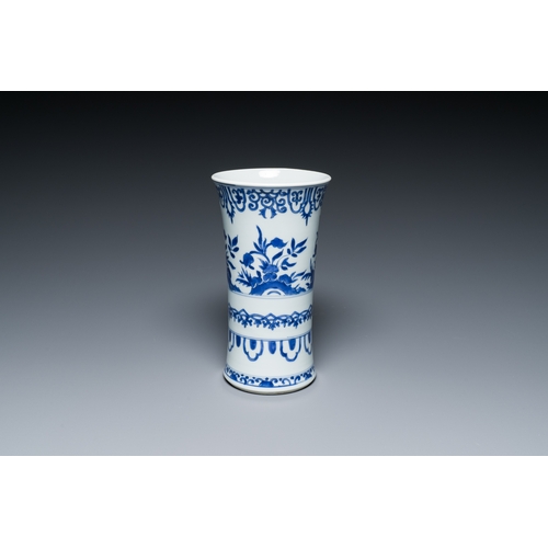 286 - A Chinese blue and white vase with floral design, KangxiDescription:H.: 21,2 cmCondition reports:Ple... 