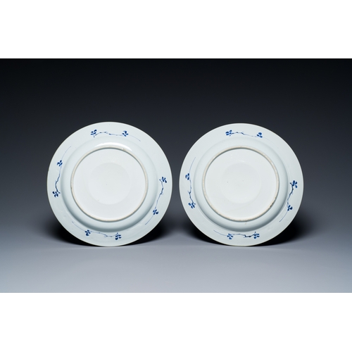 291 - A pair of Chinese blue and white dishes with raised central medallions, KangxiDescription:Dia.: 29 c... 