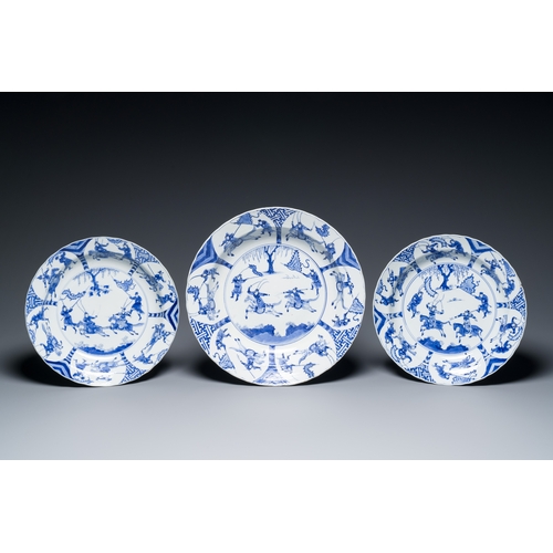 293 - Three large deep Chinese blue and white 'hunting scene' dishes, Chenghua mark, KangxiDescription:Dia... 