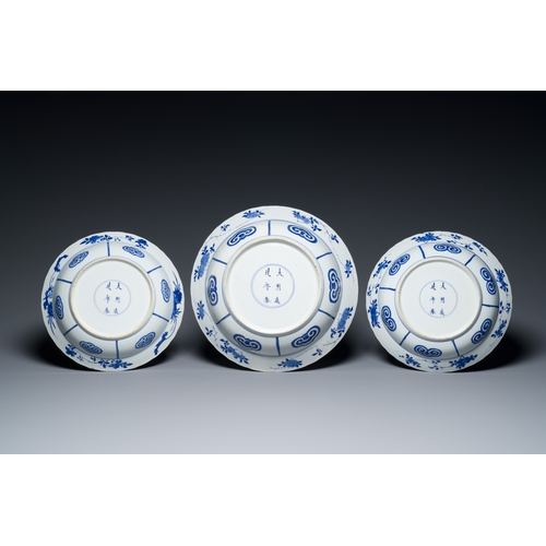 293 - Three large deep Chinese blue and white 'hunting scene' dishes, Chenghua mark, KangxiDescription:Dia... 