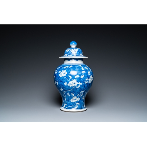 296 - A Chinese blue and white 'prunus on cracked ice' vase and cover, KangxiDescription:H.: 44,5 cm Condi... 