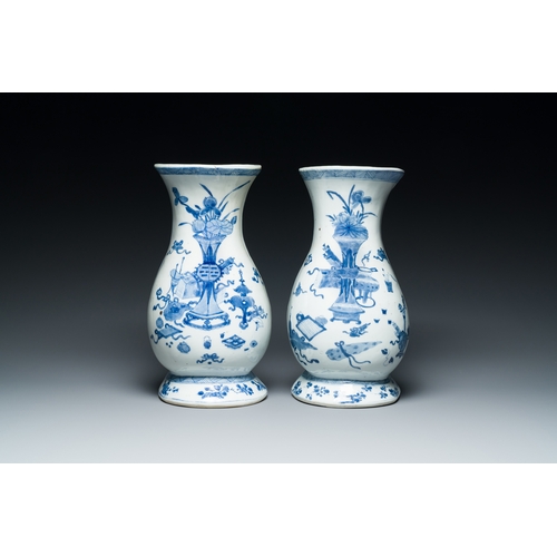 306 - A pair of Chinese blue and white wall pocket vases with antiquities, KangxiDescription:H.: 29 cmCond... 