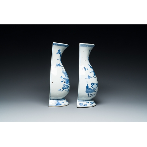 306 - A pair of Chinese blue and white wall pocket vases with antiquities, KangxiDescription:H.: 29 cmCond... 