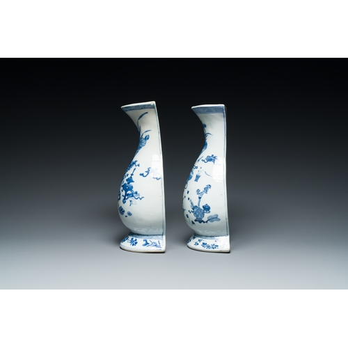 306 - A pair of Chinese blue and white wall pocket vases with antiquities, KangxiDescription:H.: 29 cmCond... 