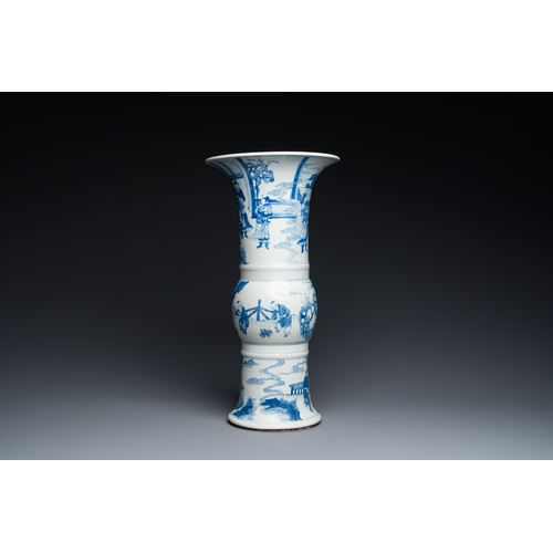 310 - A Chinese blue and white 'gu' vase with figurative design, probably KangxiDescription:H.: 46 cmCondi... 