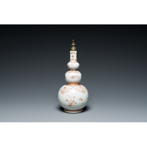 321 - A Chinese iron-red and gilt-decorated triple gourd vase, KangxiDescription:H.: 30,5 cm (incl. the mo... 