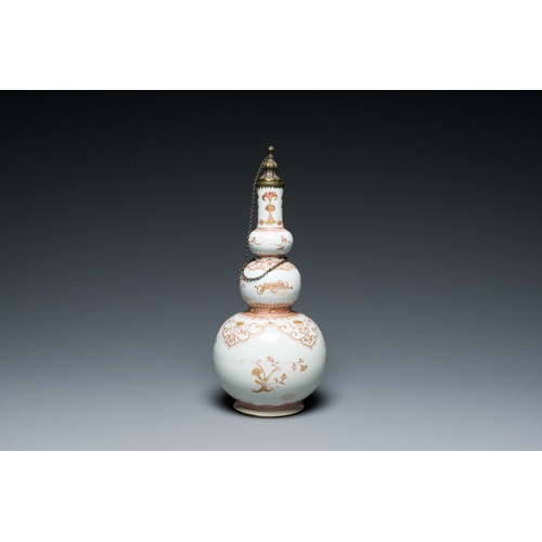 321 - A Chinese iron-red and gilt-decorated triple gourd vase, KangxiDescription:H.: 30,5 cm (incl. the mo... 