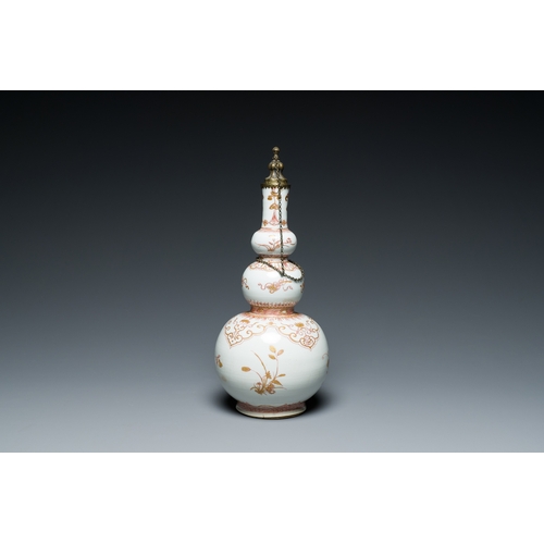 321 - A Chinese iron-red and gilt-decorated triple gourd vase, KangxiDescription:H.: 30,5 cm (incl. the mo... 