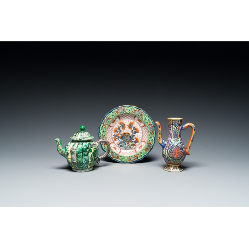 328 - A Chinese clobbered blue and white ewer, a plate and a verte biscuit teapot, KangxiDescription:Dia.:... 