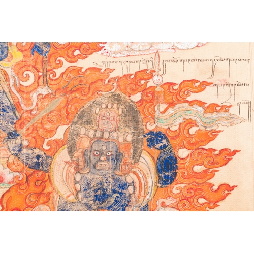 395 - A silk thangka depicting Mahakala, Tibet, 19th C.Description:Dim.: 79 x 78 cm (the frame)Dim.: 64,5 ... 